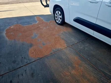Auburn Commercial Pressure Washing: How to Remove Tough Oil Stains from Concrete Parking Lots